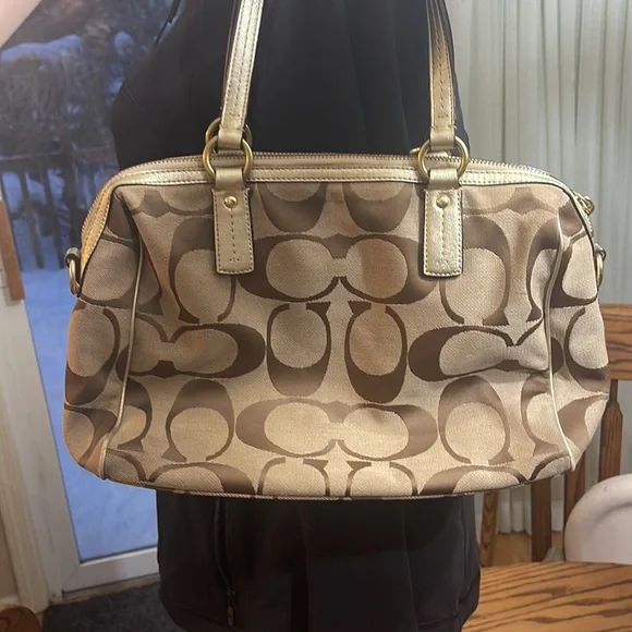 Gold coach purse